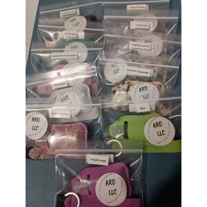 Hand sanitizers (scents in description)- 1 oz with keychain holder & wristlet